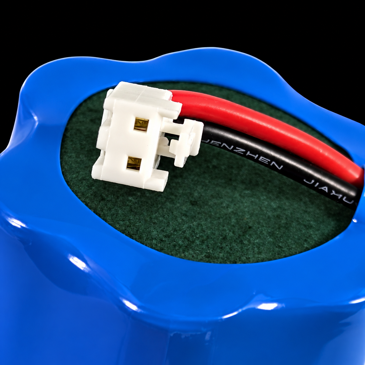 FLi OVERLANDER battery pack two-pin connector detail on black