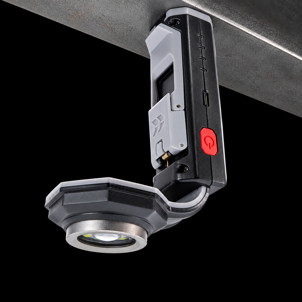 FLEXIT Pocket Light 4.0 attached by its magnetic base on black